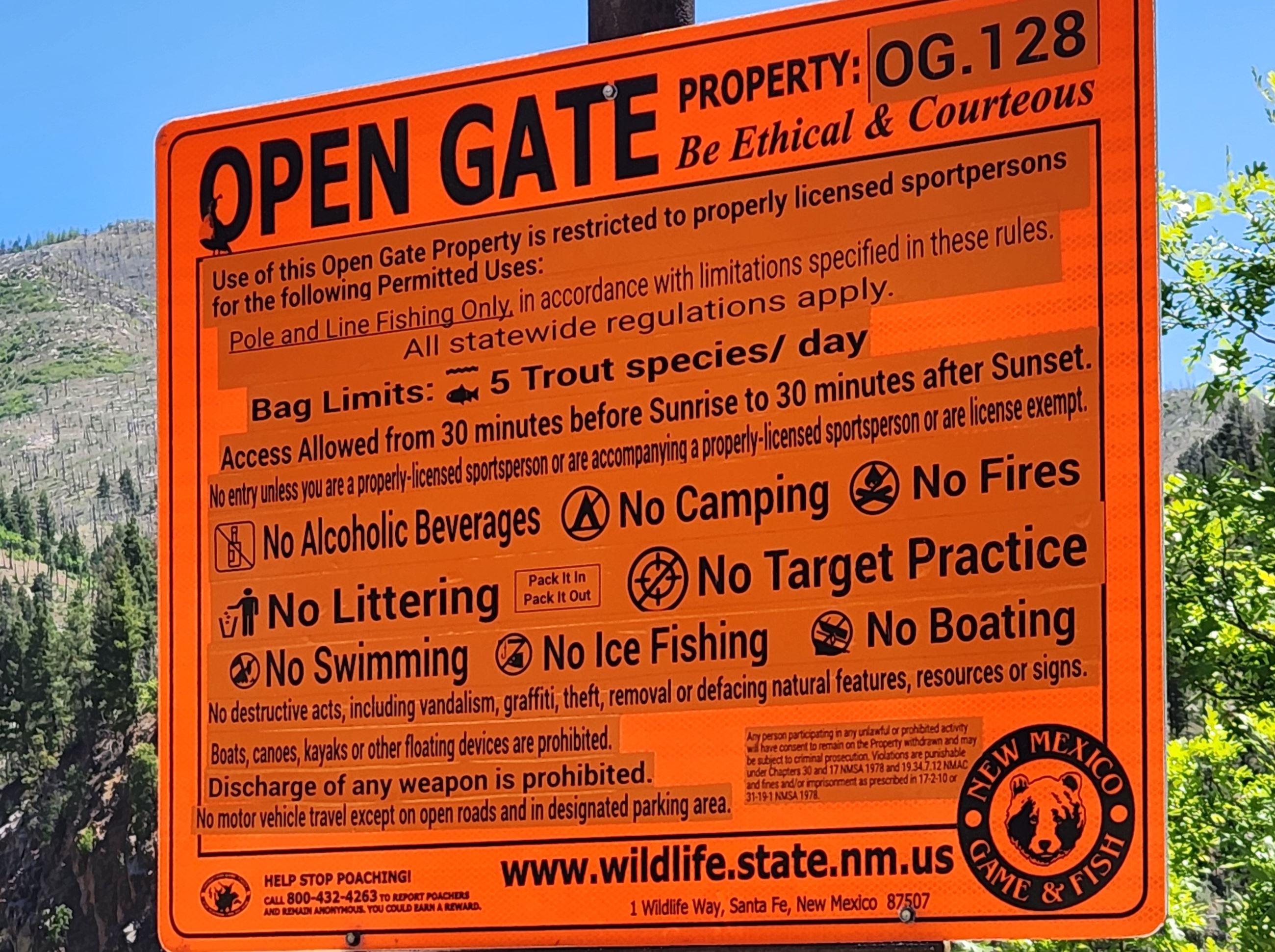 Open Gate Property sign at Bonito Lake with rules of use listed.